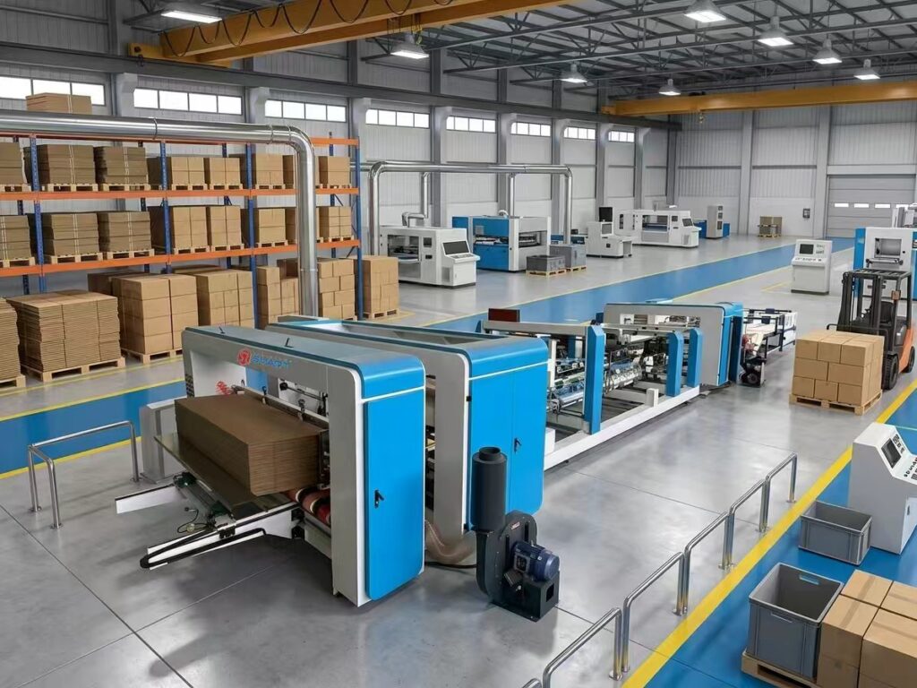 Automatic folder gluer stitcher strapper machine processing corrugated cardboard in a factory.